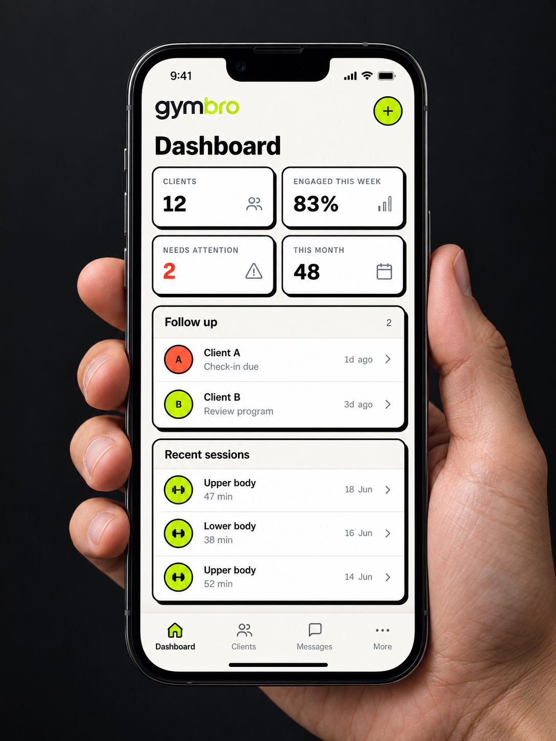 A hand holding an iPhone with an illustrative GymBro coaching dashboard in charcoal, off-white and lime